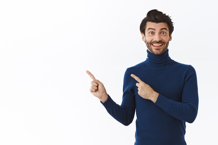 Gambar ini memiliki atribut alt yang kosong; nama berkasnya adalah happy-cheerful-bearded-man-blue-sweater-recommend-awesome-product-smiling-impressed-pointing-upper-left-corner-promote-something-white-wall_176420-37081.jpg